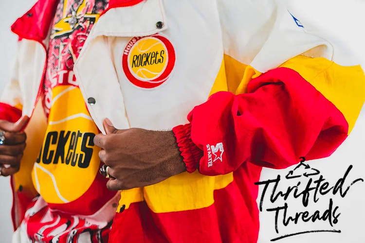 A close up on a vintage jacket with the Thrifted Threads logo