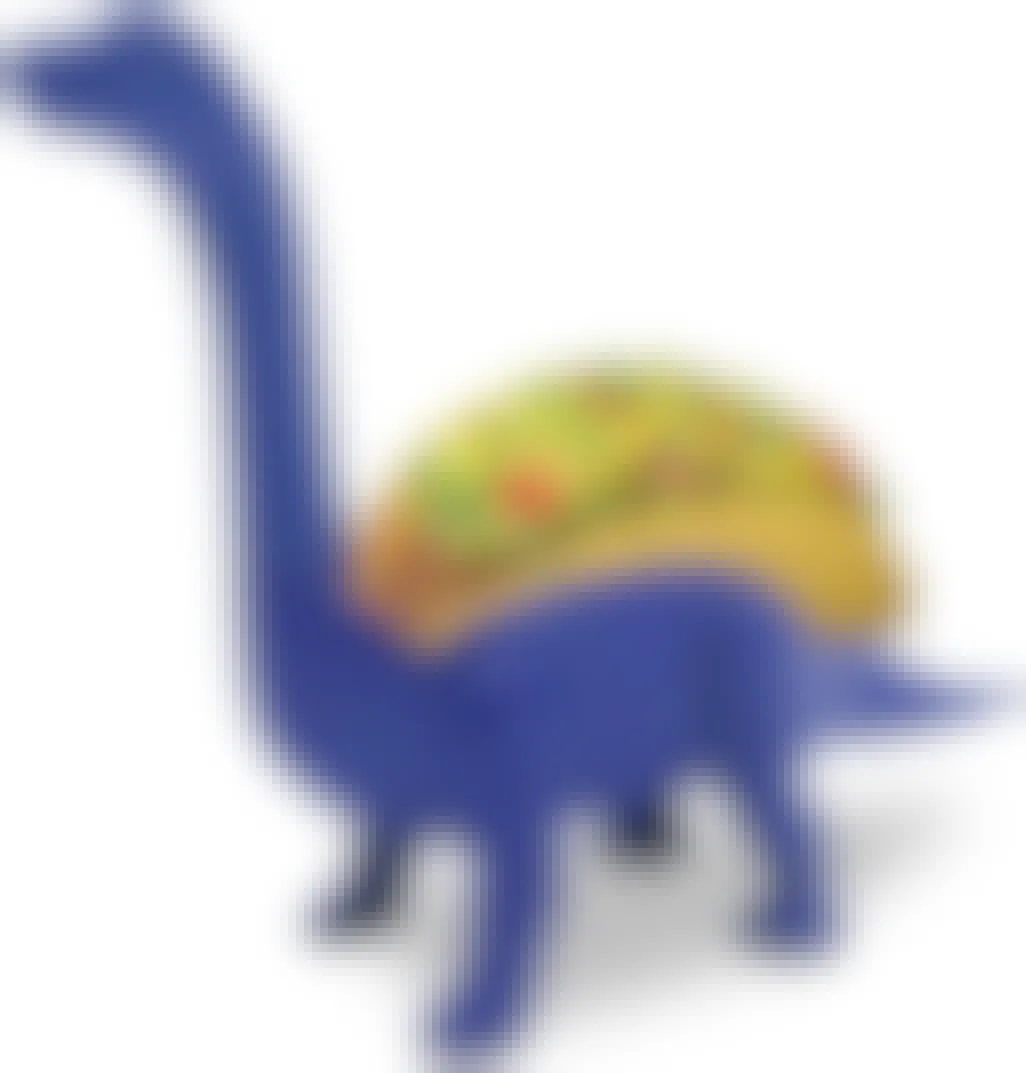 best white elephant gifts - A blue plastic dinosaur taco holder with a taco on a white background
