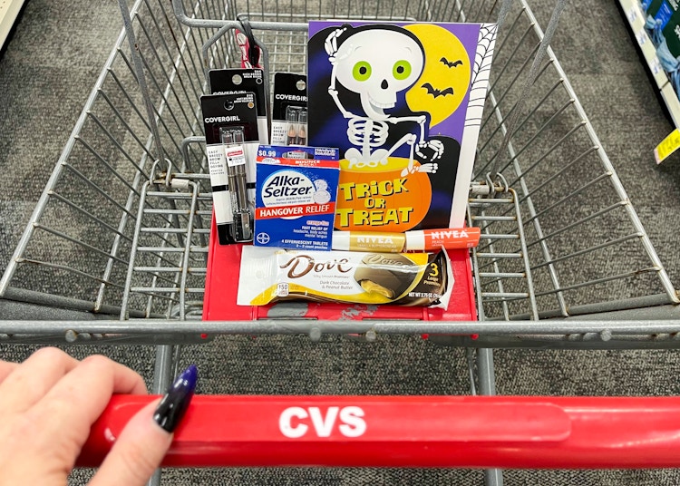 cvs shopping cart with dove, alka-seltzer, covergirl, hallmark, and nivea