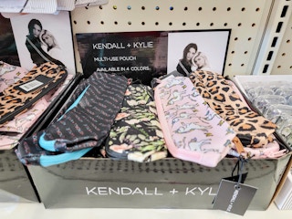a box with different designs of kendall & kylie cosmetic bags