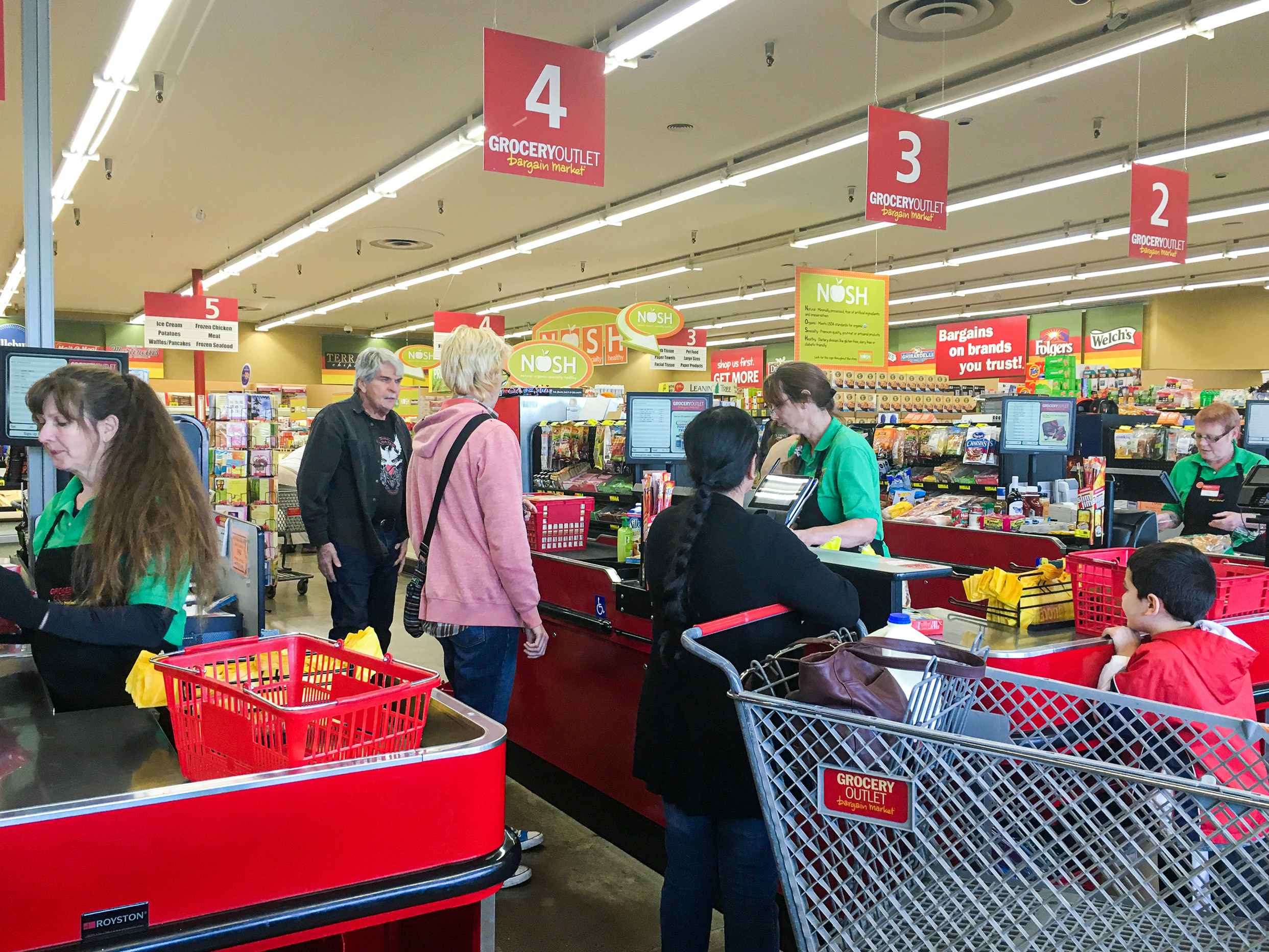 People checking out at a Grocery Outlet store
