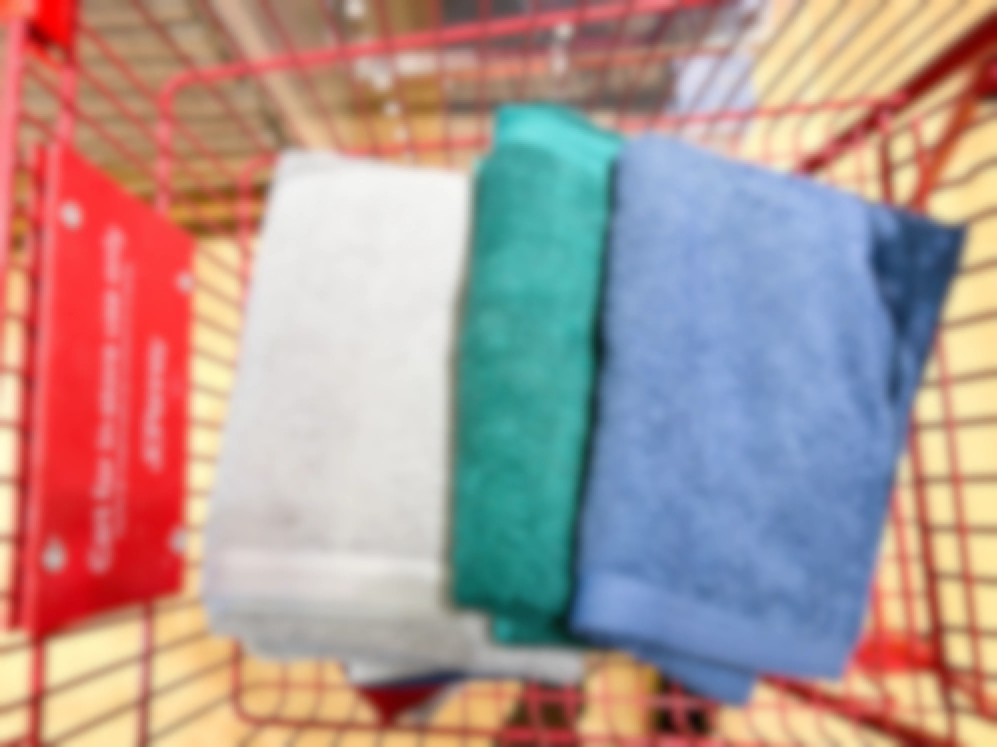 solid colors towels in a shopping cart