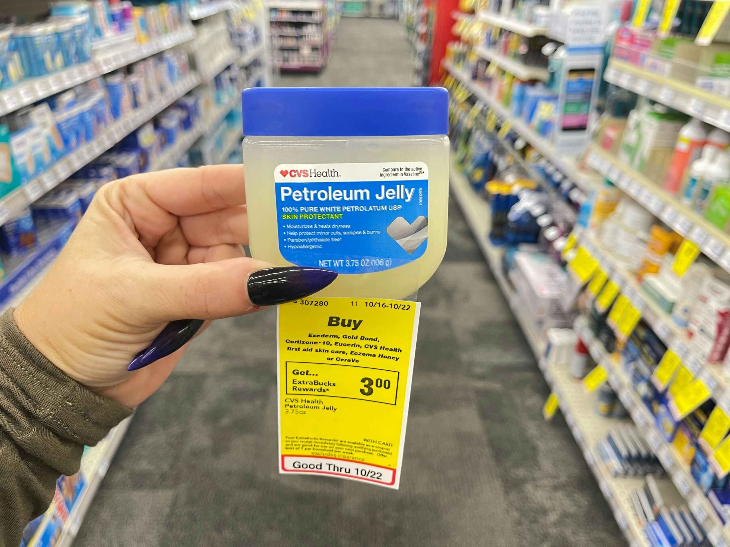 cvs health petroleum jelly above buy one get $3 ExtraBucks promo tag