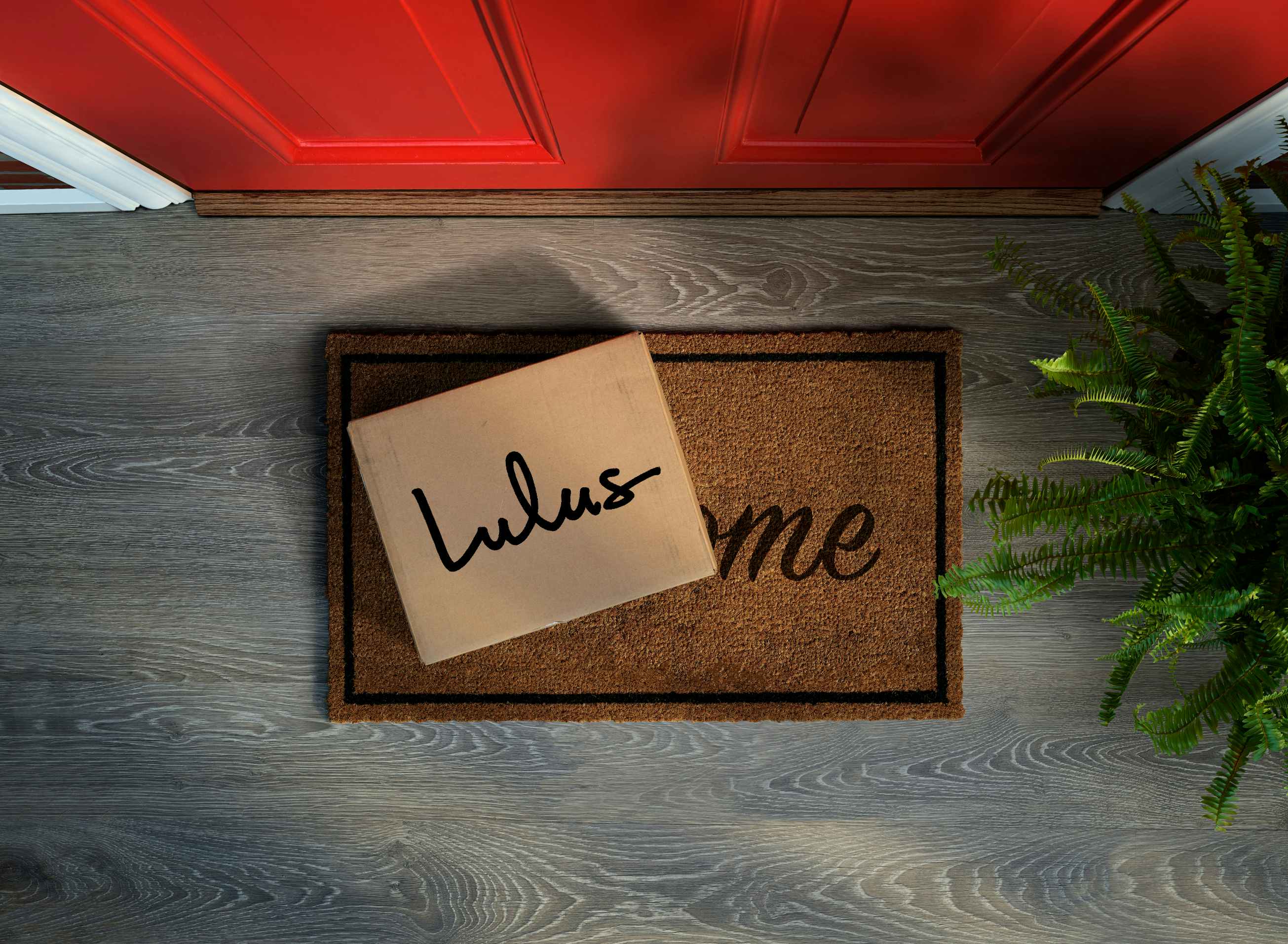 A Lulus package on a porch outside someone's front door