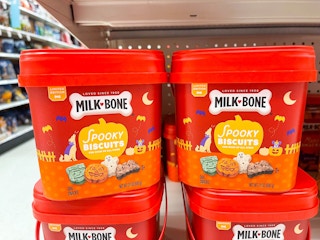 milk bone dog treat buckets stacked on top of one another