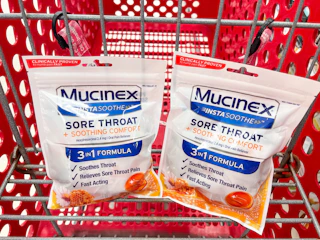 two bags of mucinex cough drops in cart