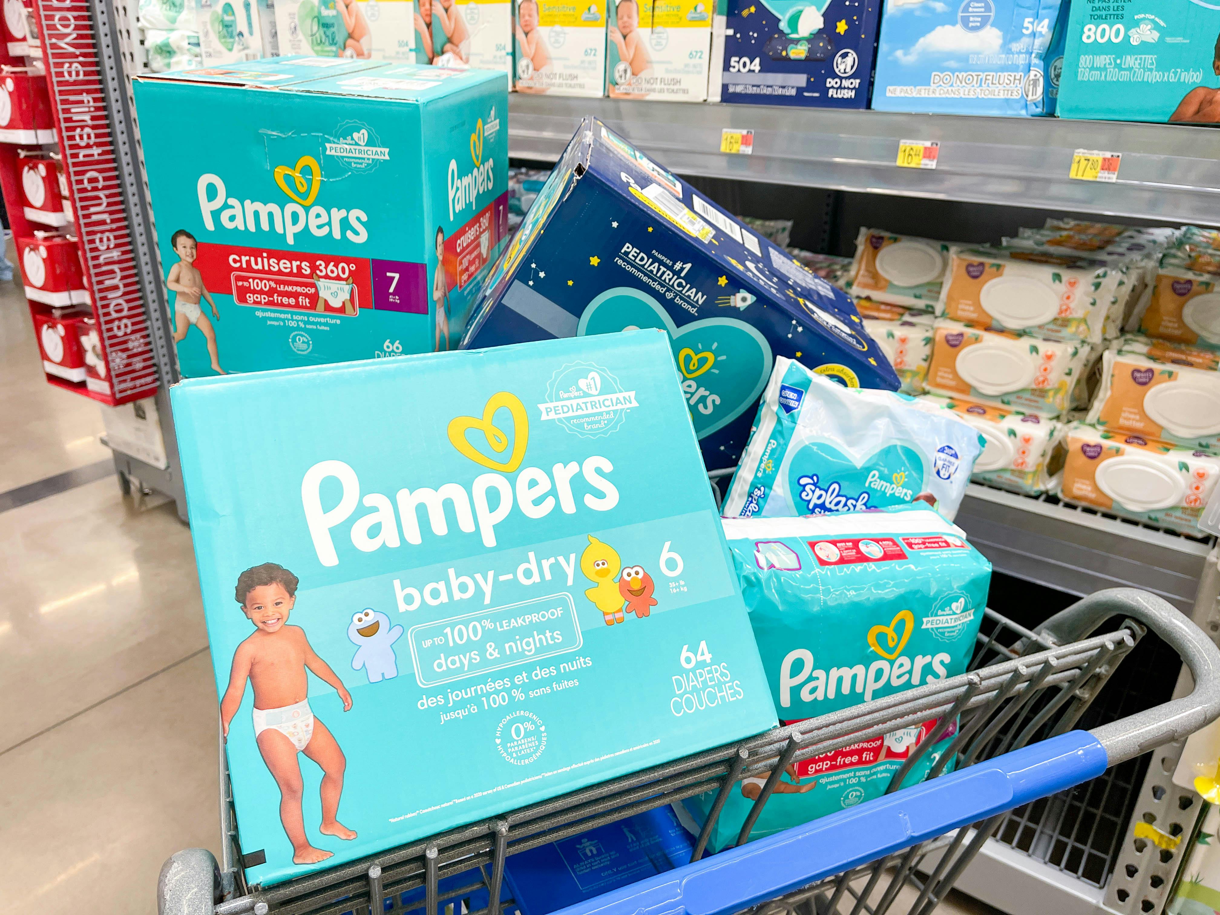 a cart filled with boxes of pampers diapers and wipes