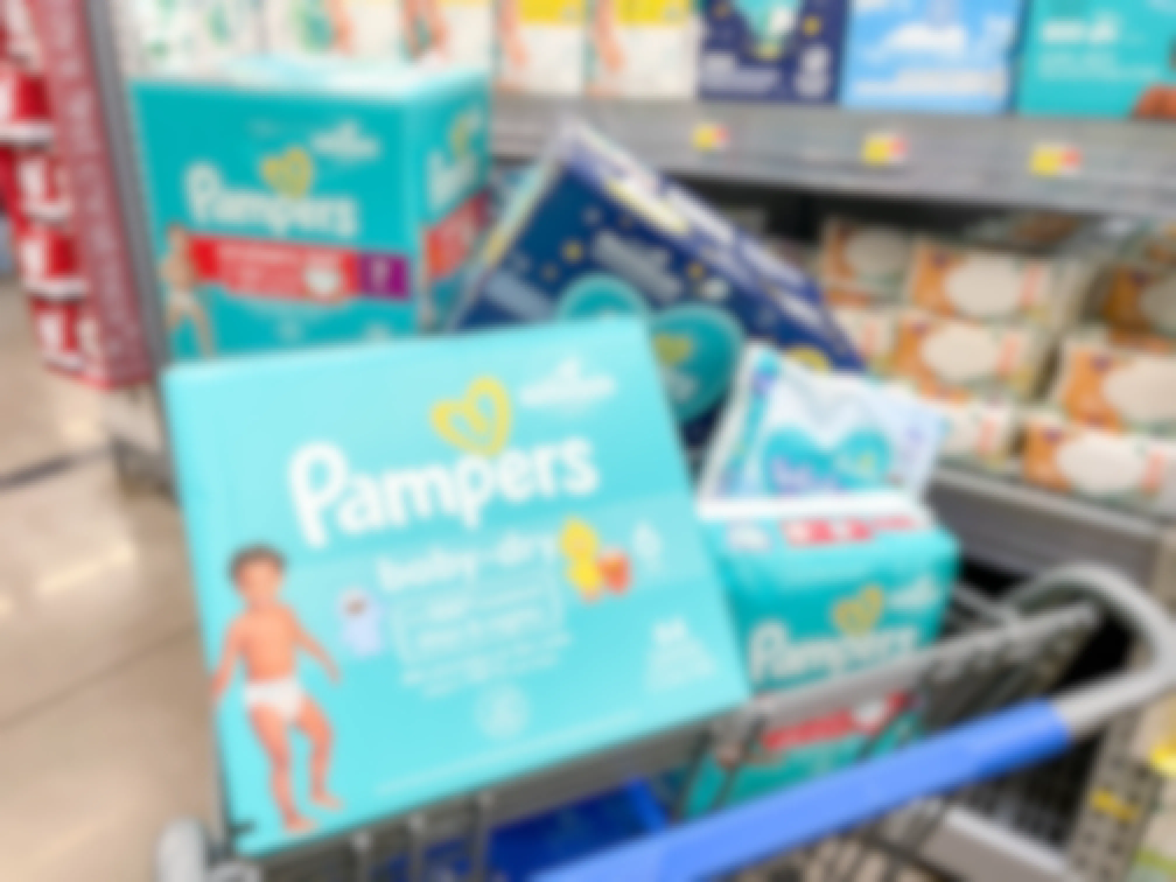 a cart filled with boxes of pampers diapers and wipes