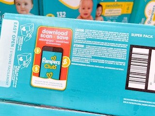 a box of pampers with the scan and save club info on box