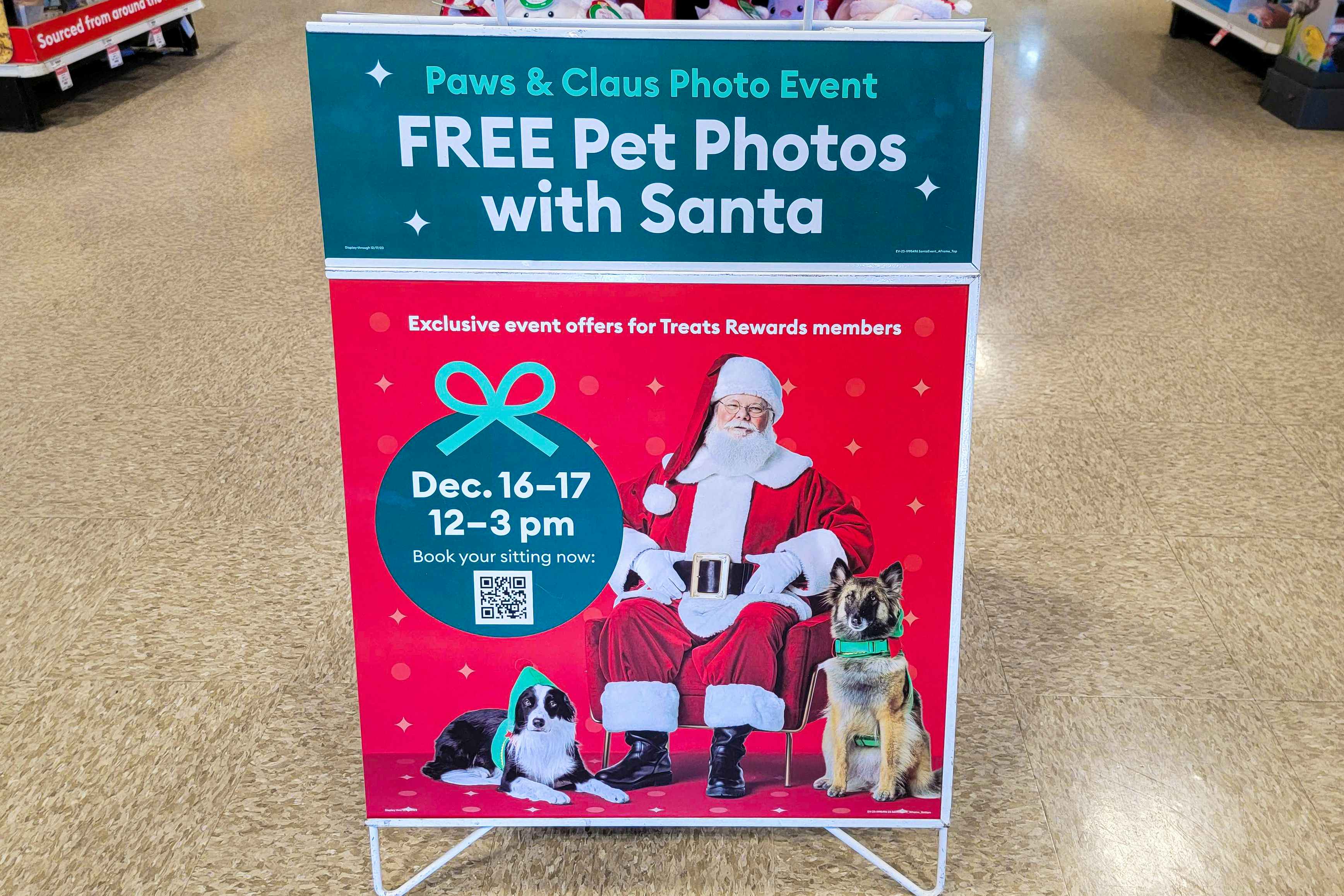 a sign for Petsmarts free pet photos with Santa