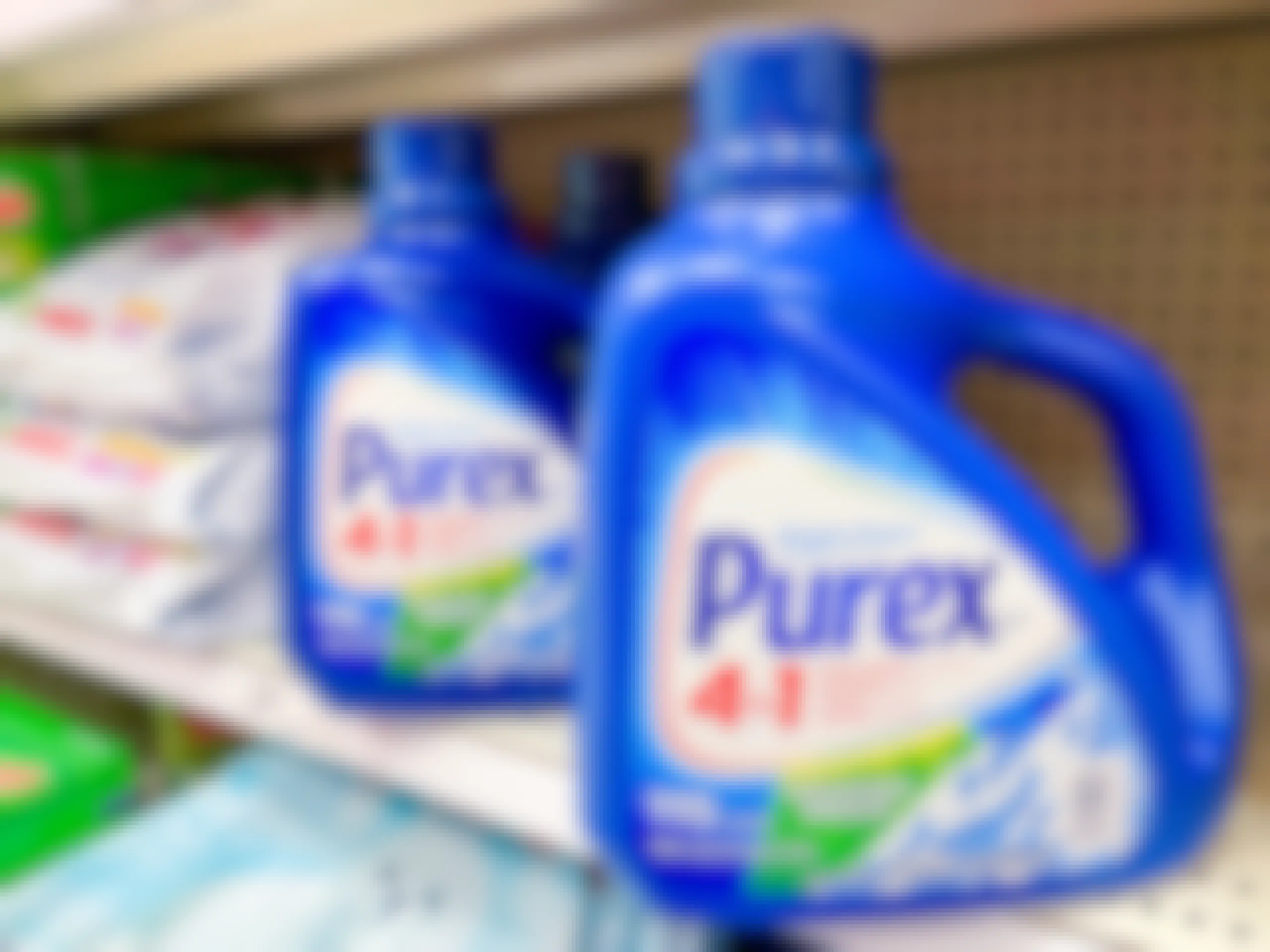 Purex laundry detergent sitting on a store shelf.