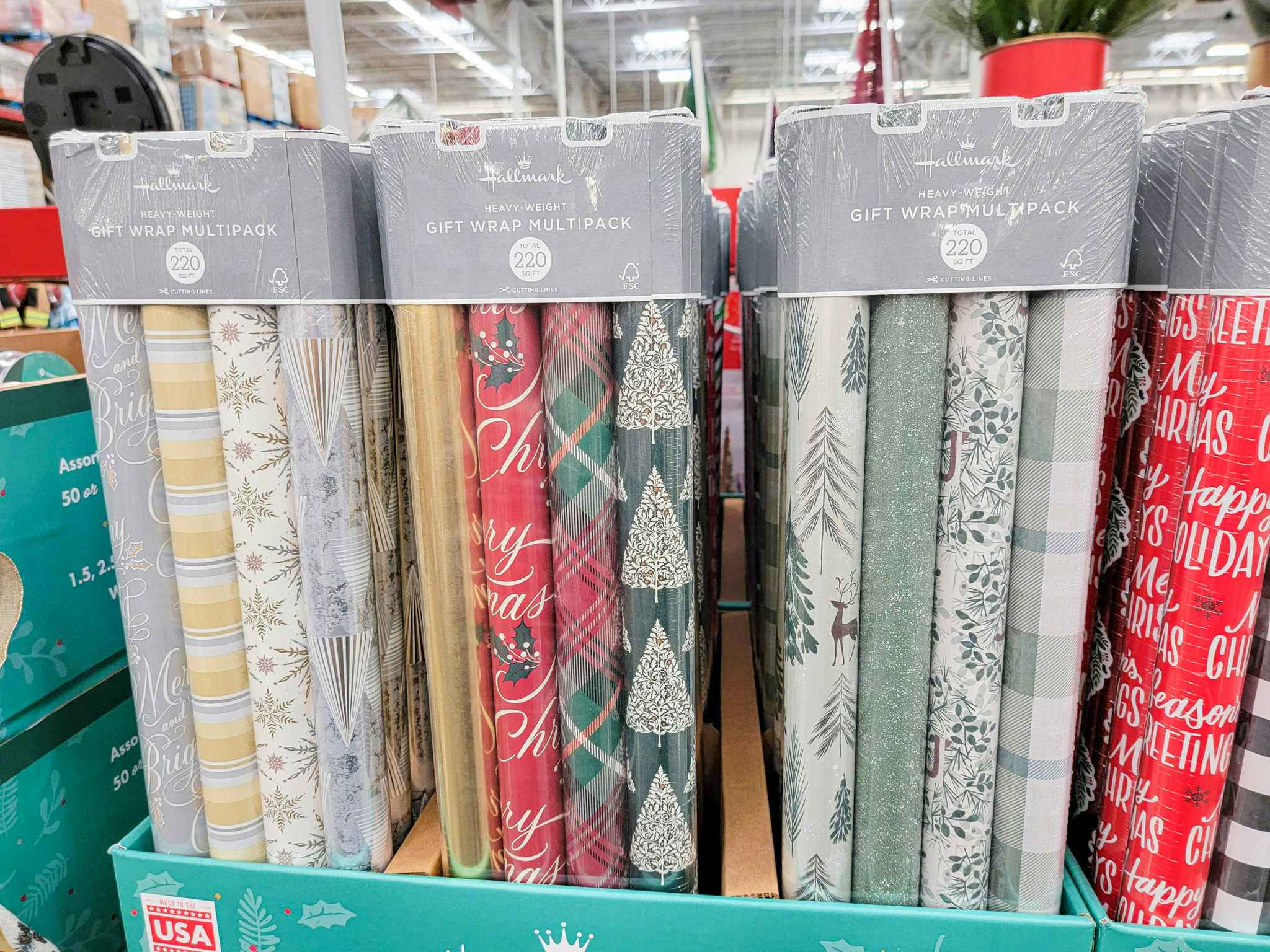 4 packs of christmas hallmark wrapping paper 