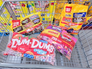 big bags of halloween candy in a cart