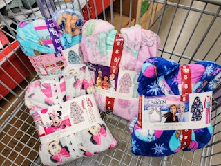 4 kids robe & pajama sets in a cart