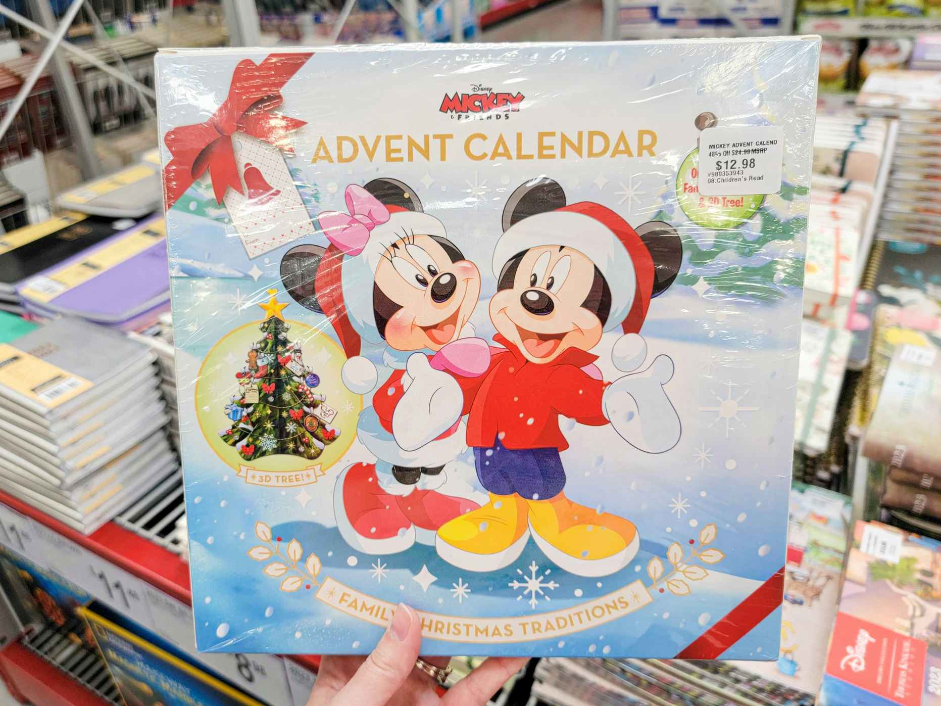 hand holding a mickey mouse advent calendar