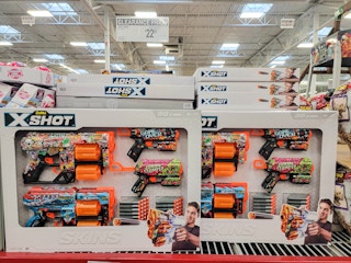 set of dart guns with a clearance tag for 22.91