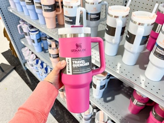 hand holding Stanly cup at Dick's on shelf