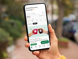 person on phone looking at starbucks app, which shows double stars day on april 12