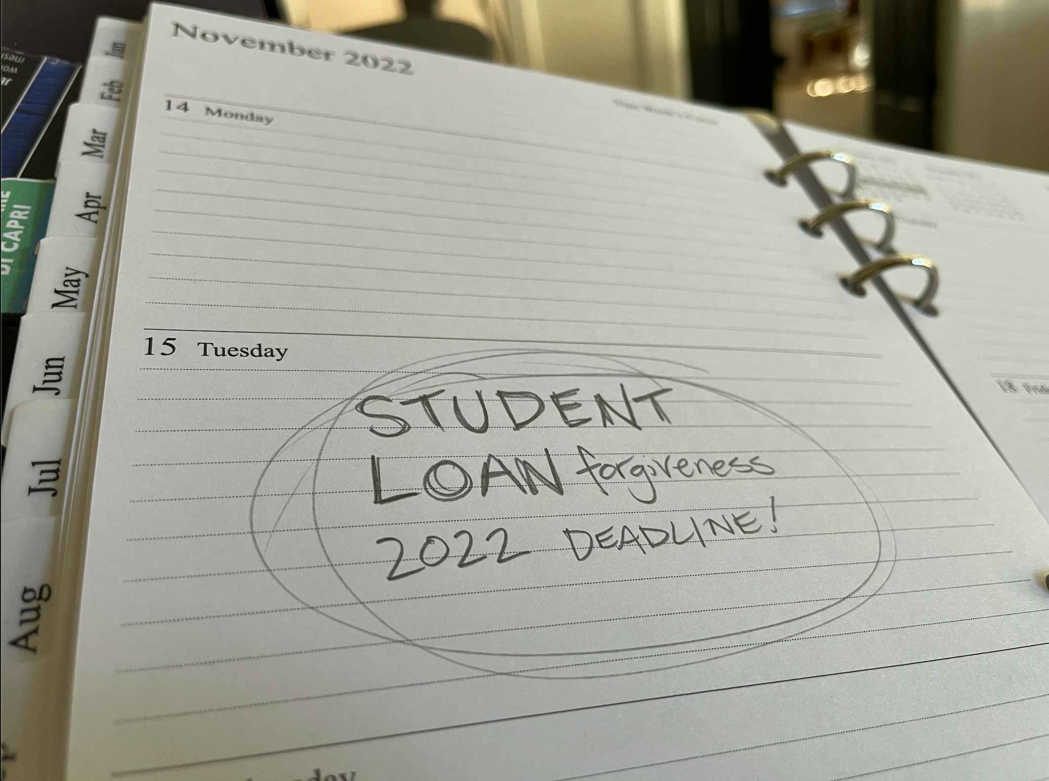 planner with Nov. 15, 2022 deadline for student loan forgiveness