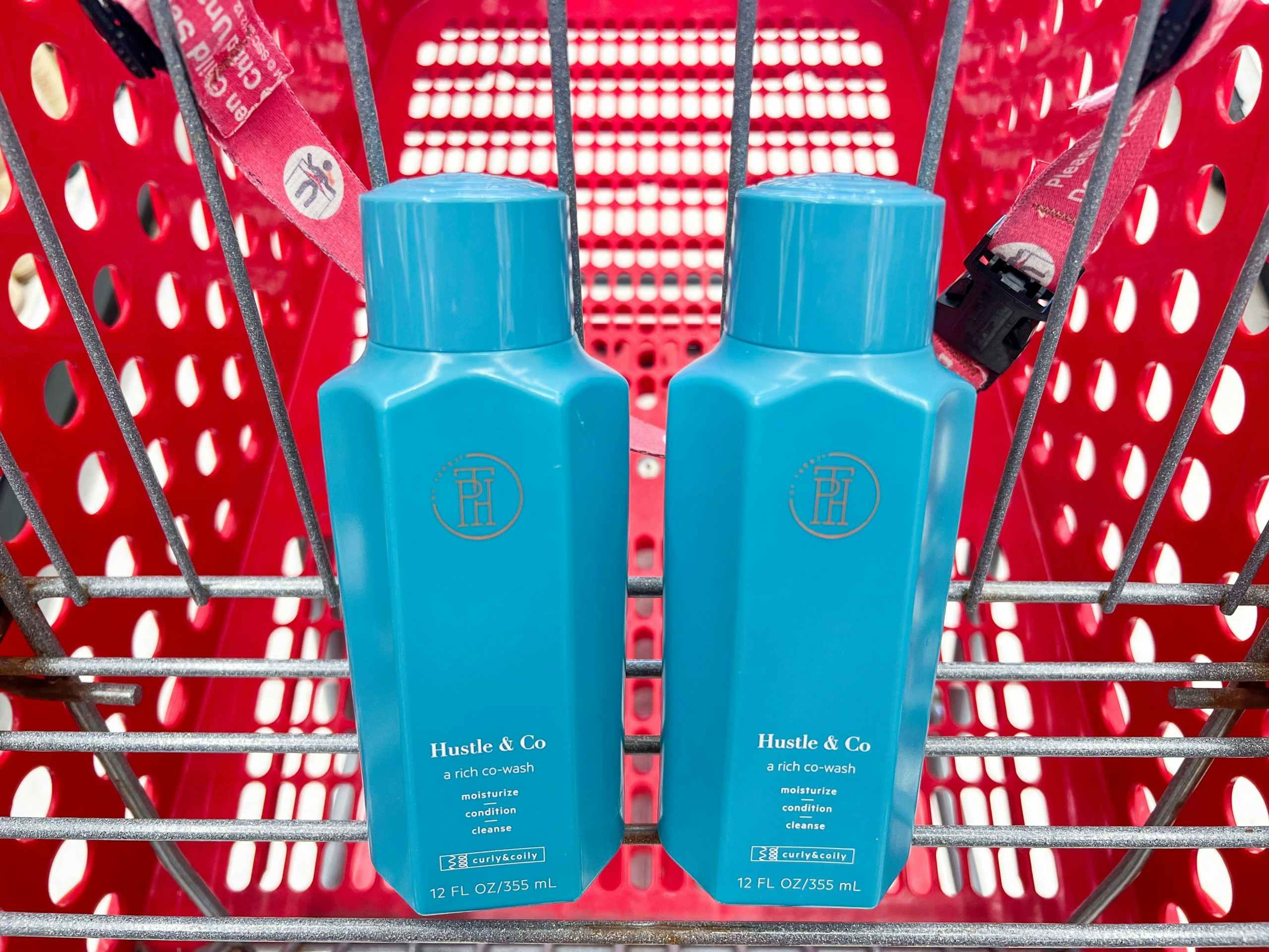 two bottles of tph hair care in cart
