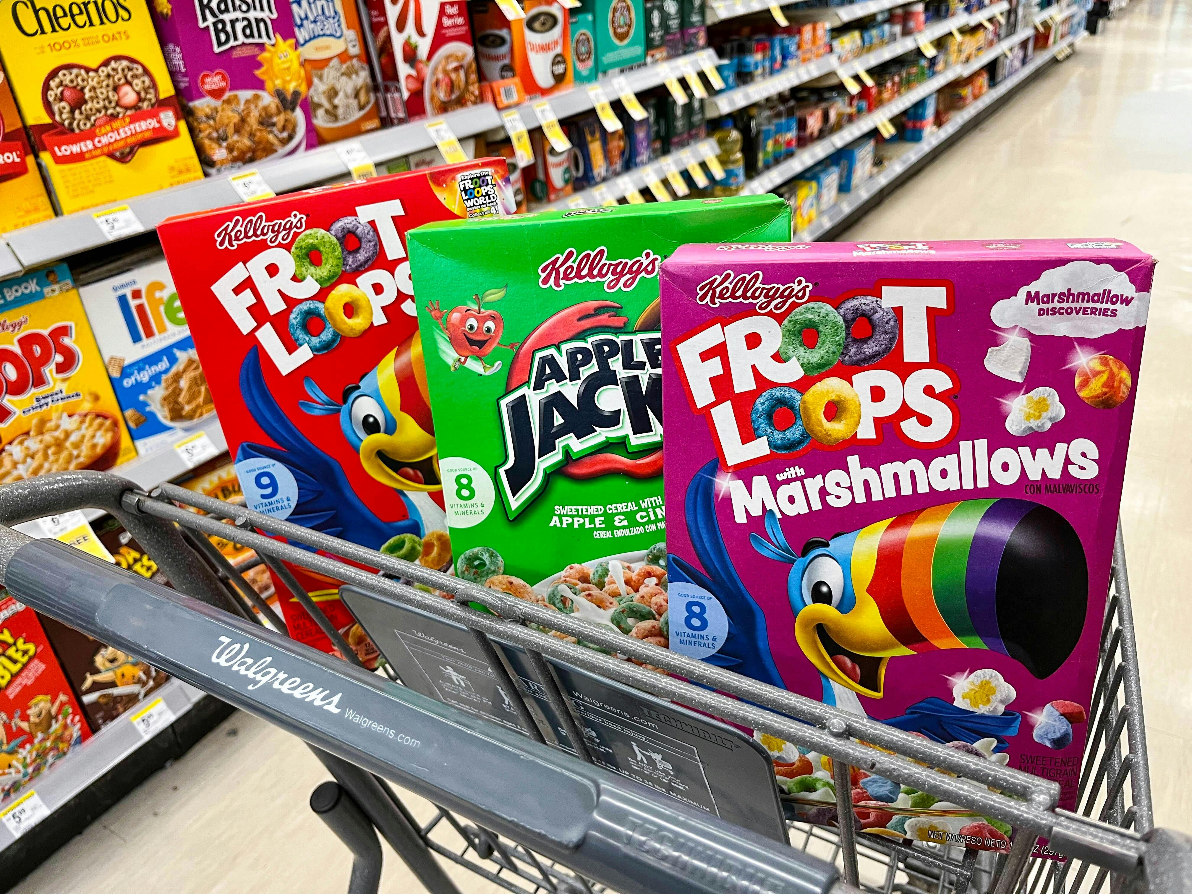 shopping cart with a box of Froot Loops, Apple Jacks, and Froot Loops with Marshmallows inside