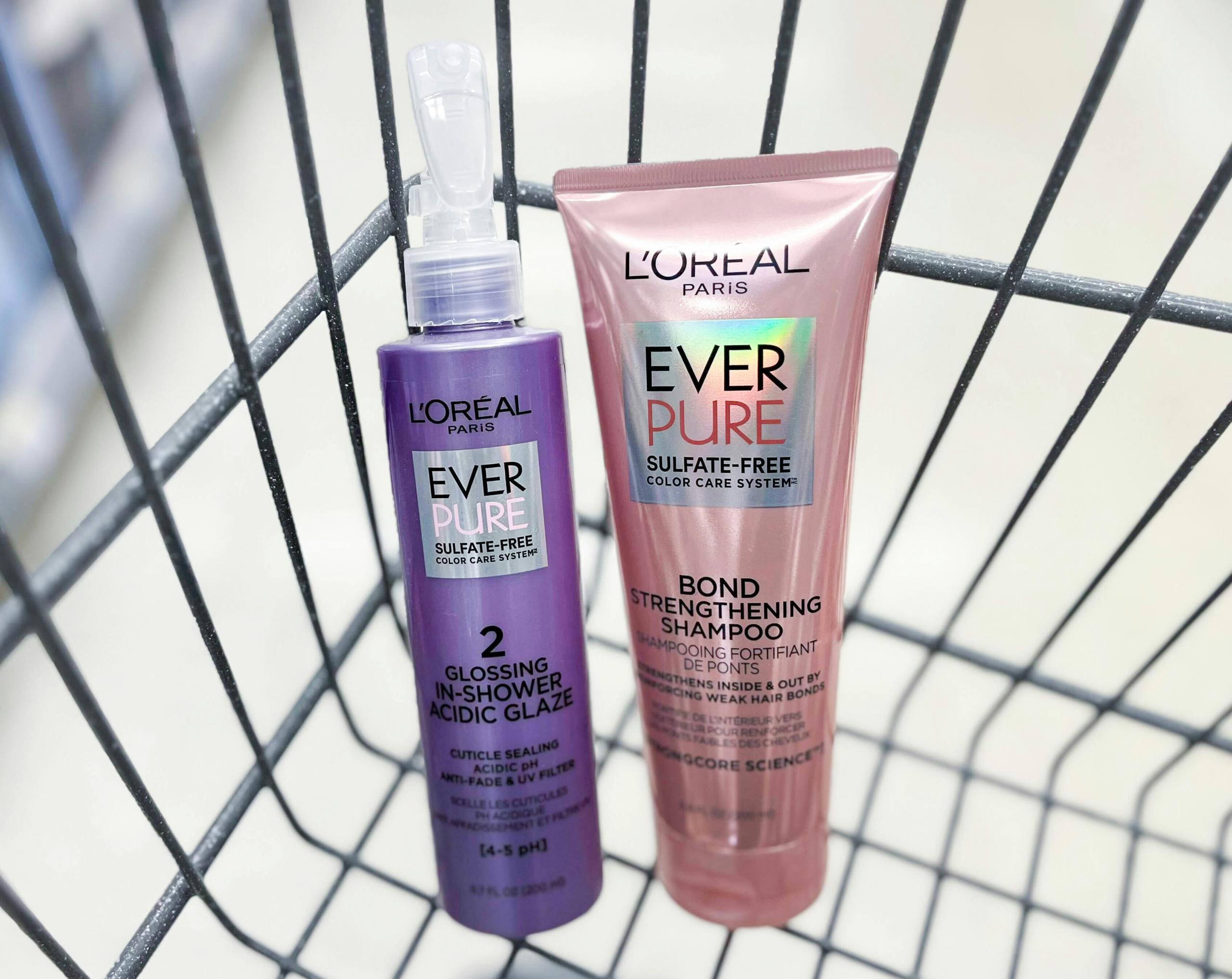 shopping cart with L'oreal Ever Pure glossing in-shower acidic glaze and bond strengthening shampoo inside