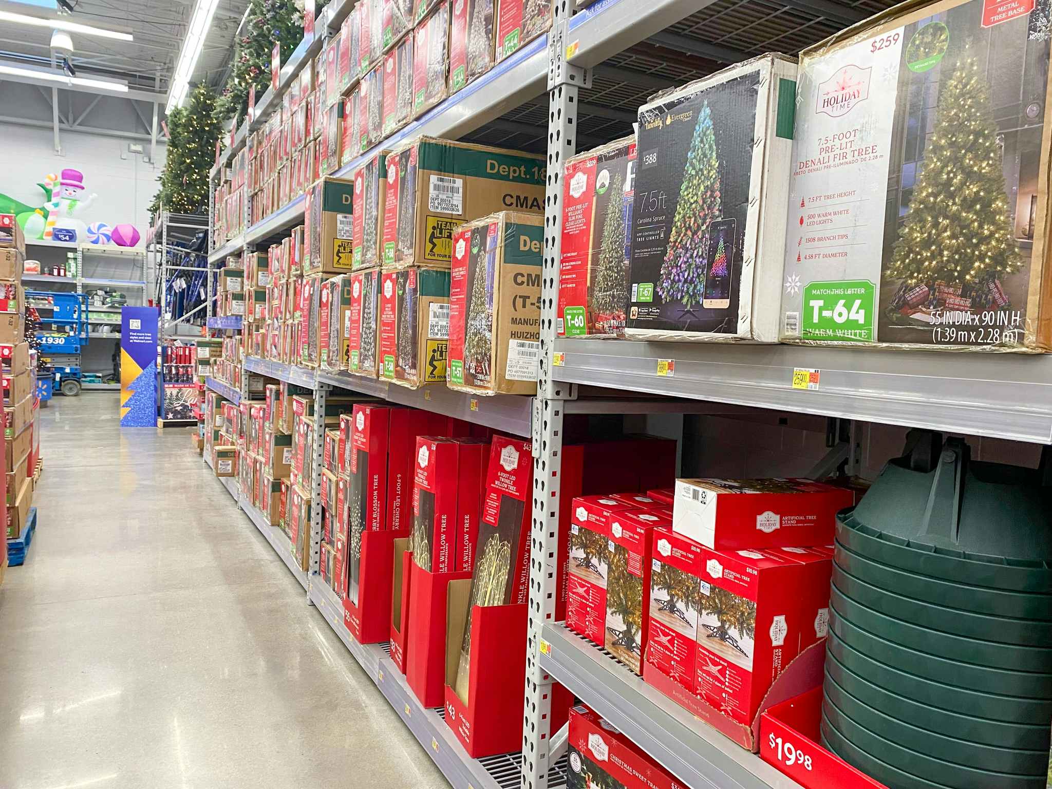 area shot of christmas trees in boxes at walmart