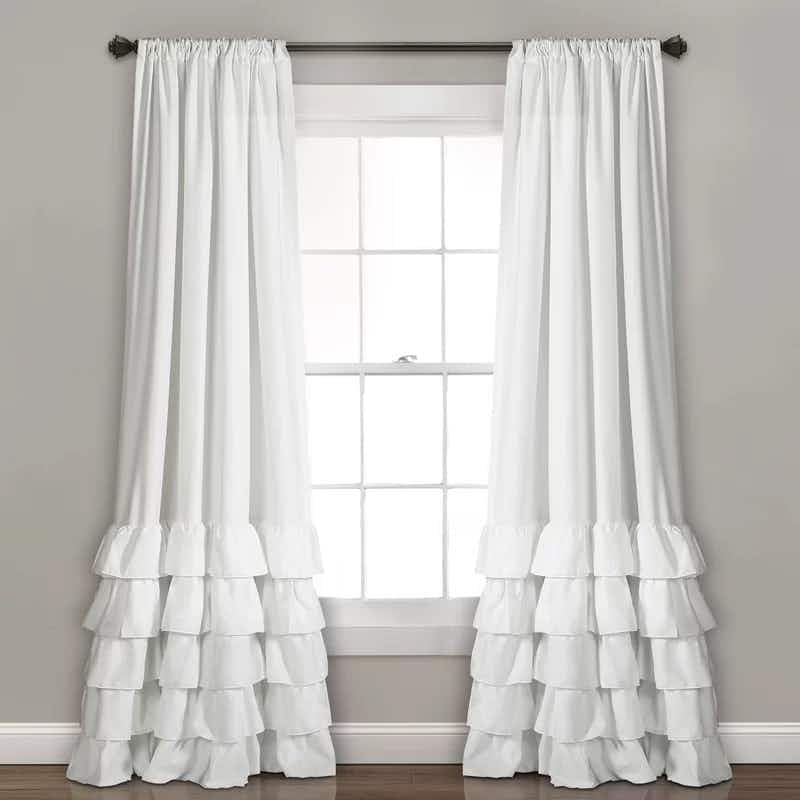White curtains framing a window