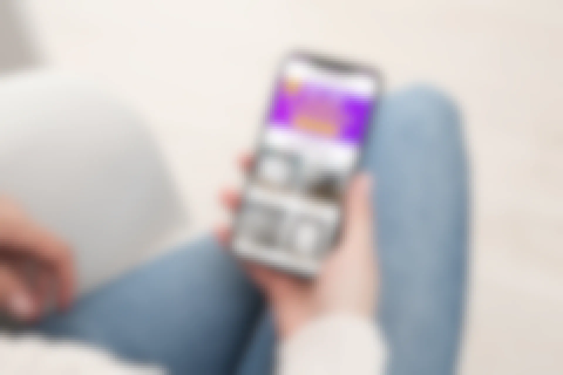 person holding phone and looking at wayfair way day landing page
