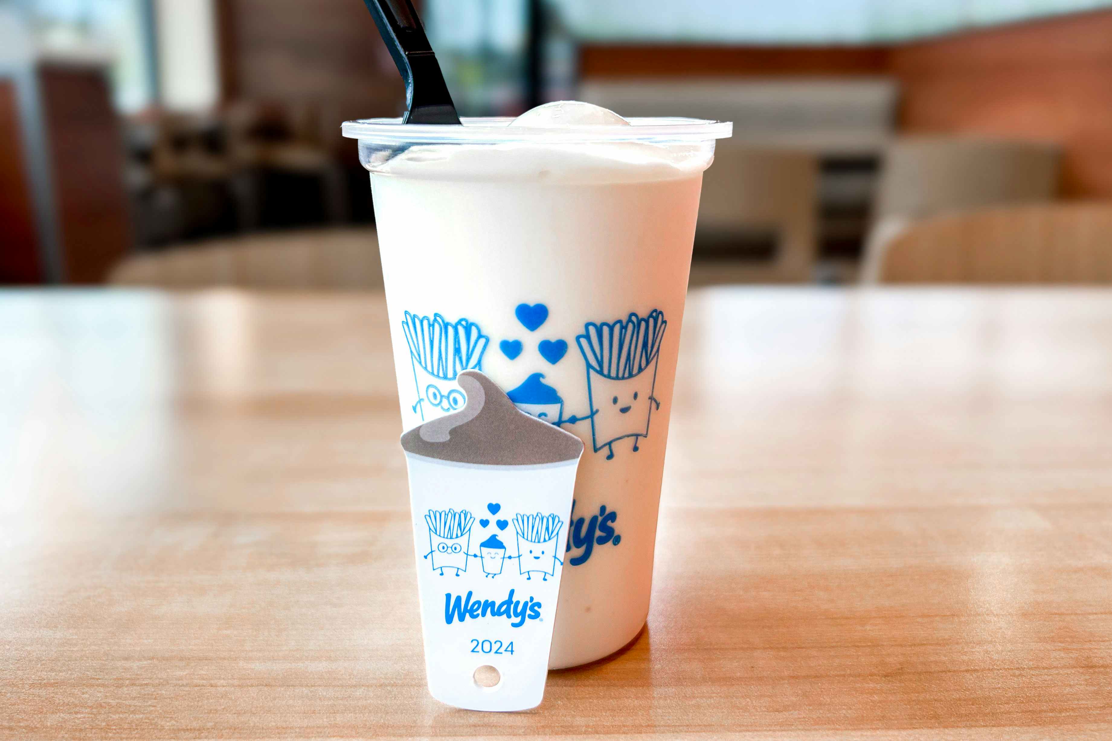 a wendys vanilla frosty sitting on a table