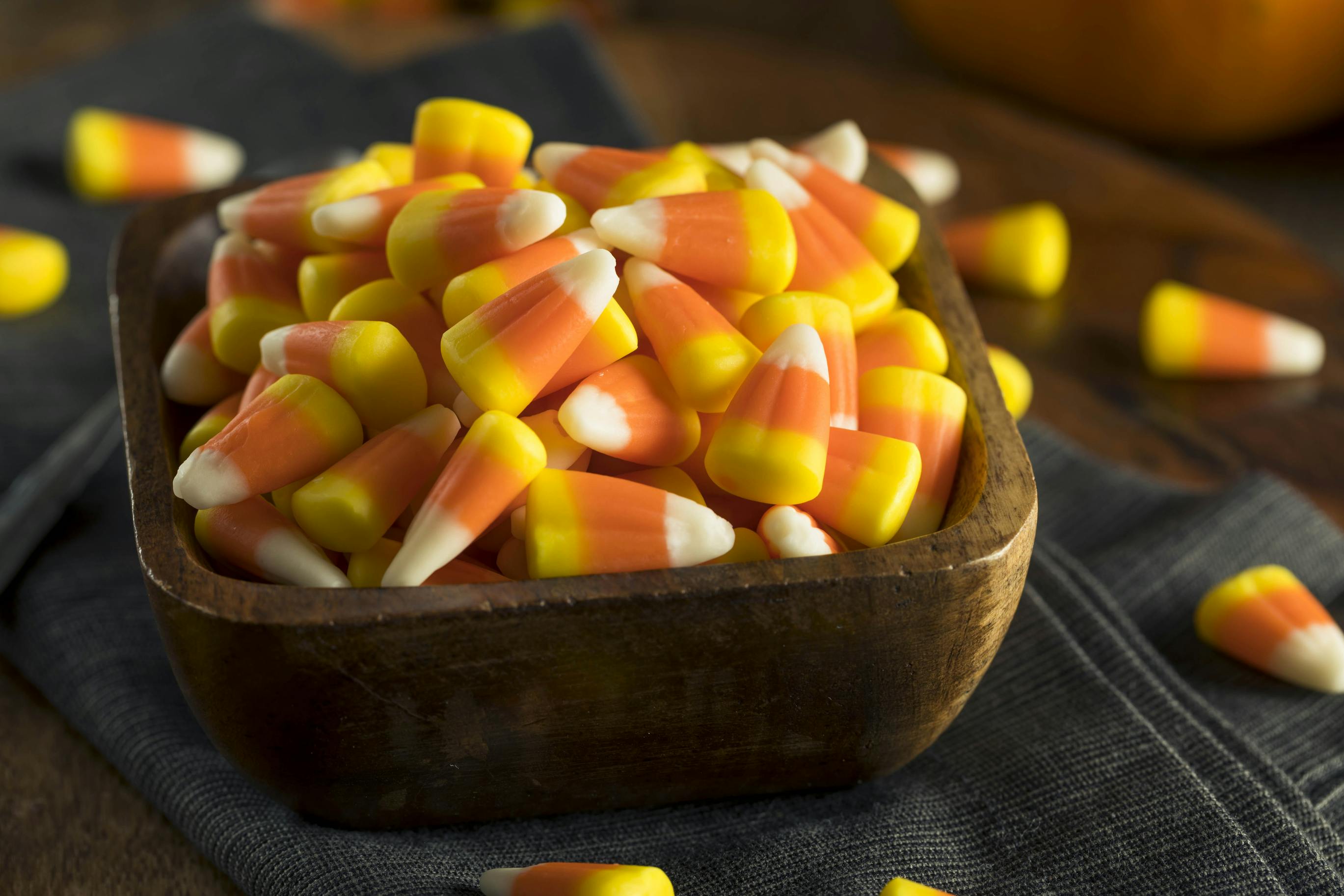 Wooden Bowl Of Candy Corn Dreamstime 2022 1665137967 1665137967 ?auto=compress,format&fit=max