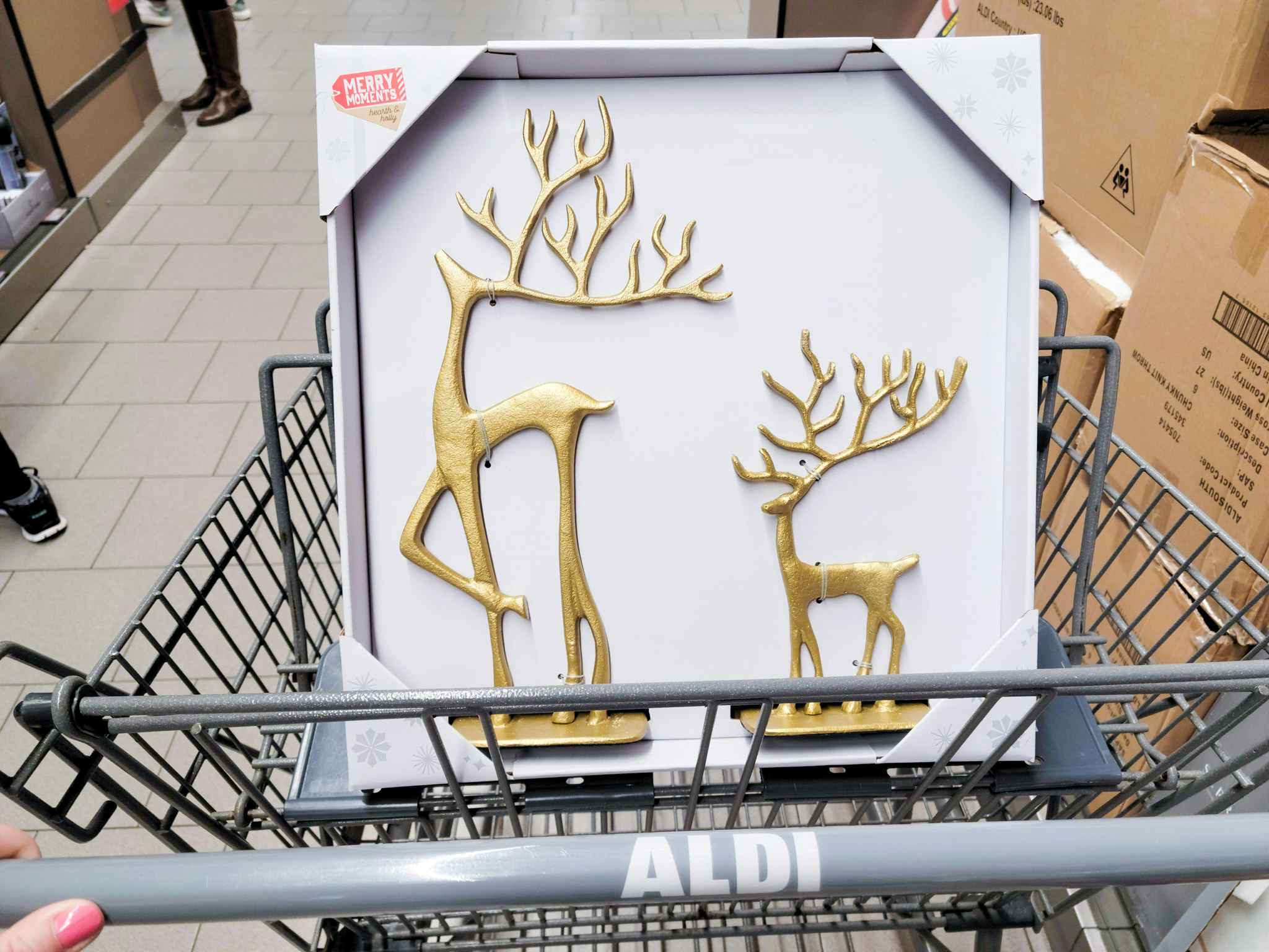 Christmas reindeer decor in an aldi cart 