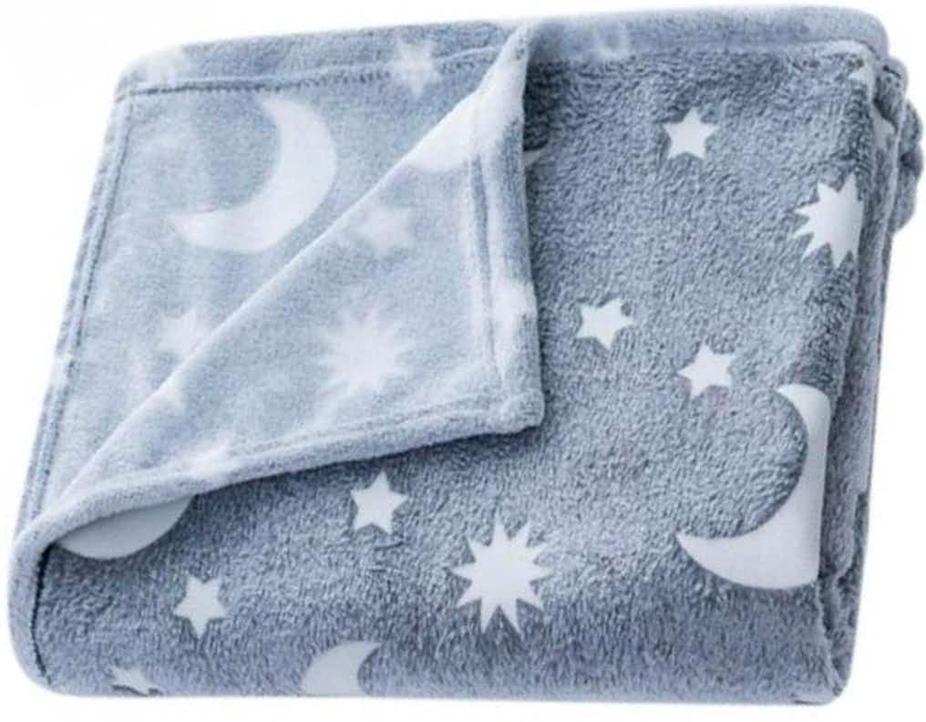gifts for teens - A soft blue blanket with stars and moons on it