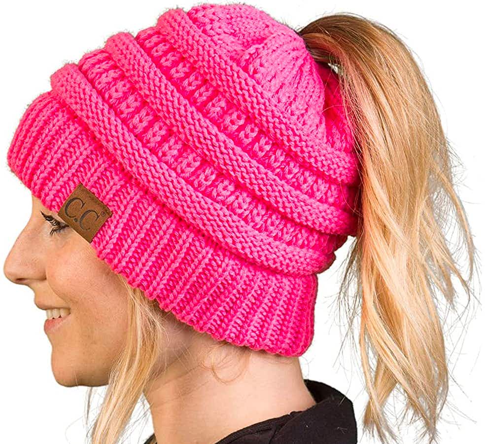 gifts for teens - A person wearing a beanie hat with their ponytail sticking through the hole in the top