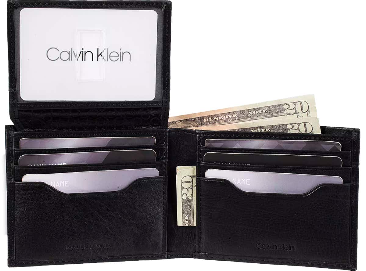 secret santa gifts - A Calvin Klein wallet with money in it