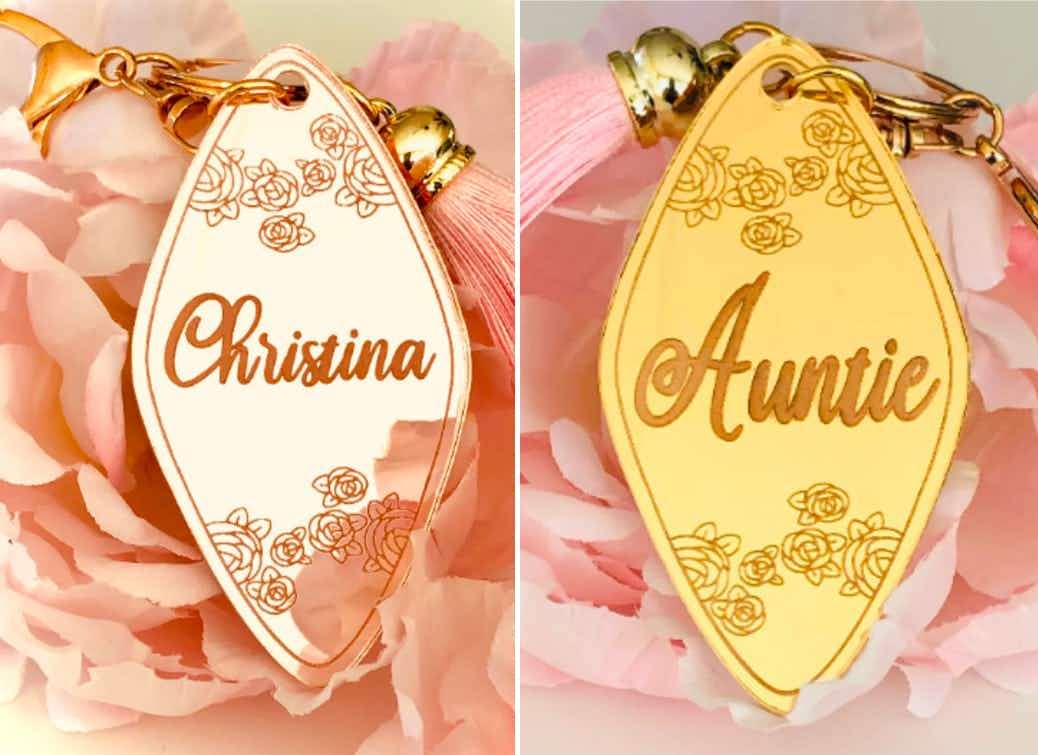 Custom keychains with "Christina" and "Auntie" on them