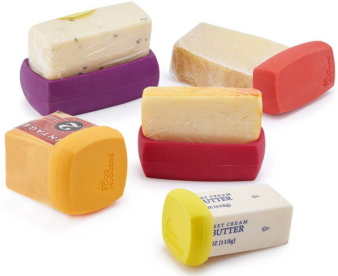 best stocking stuffer ideas - Cheeses and butter with some Food Huggers caps on the open ends.