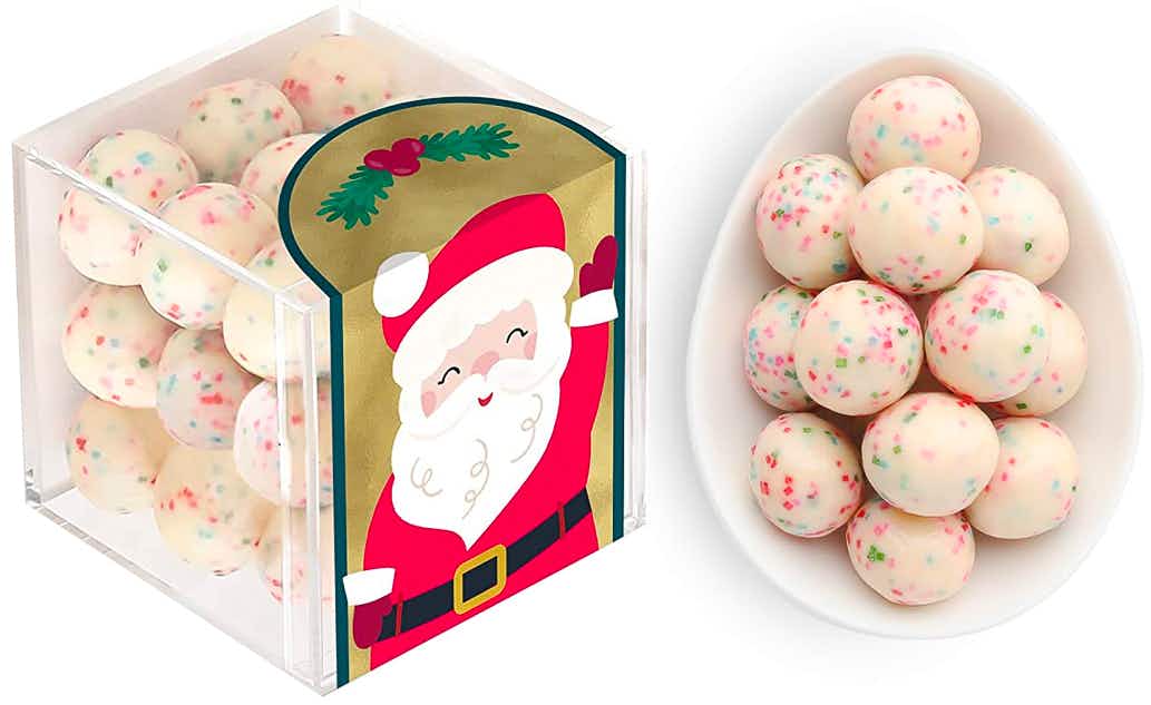 best stocking stuffer ideas - A Sugarfina Santa's Cookies Candy Cube next to the candy in a dish