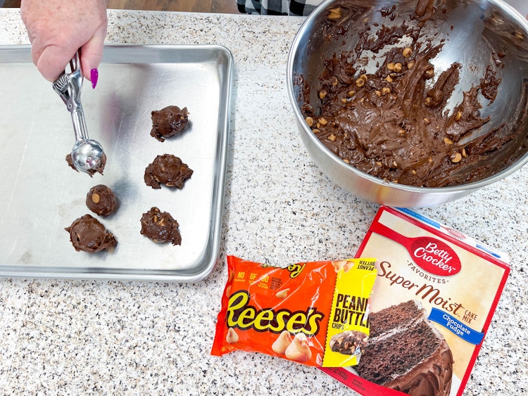 making cookies with boxes cake and peanut butter chips 