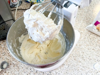homemade frosting in an electric mixer