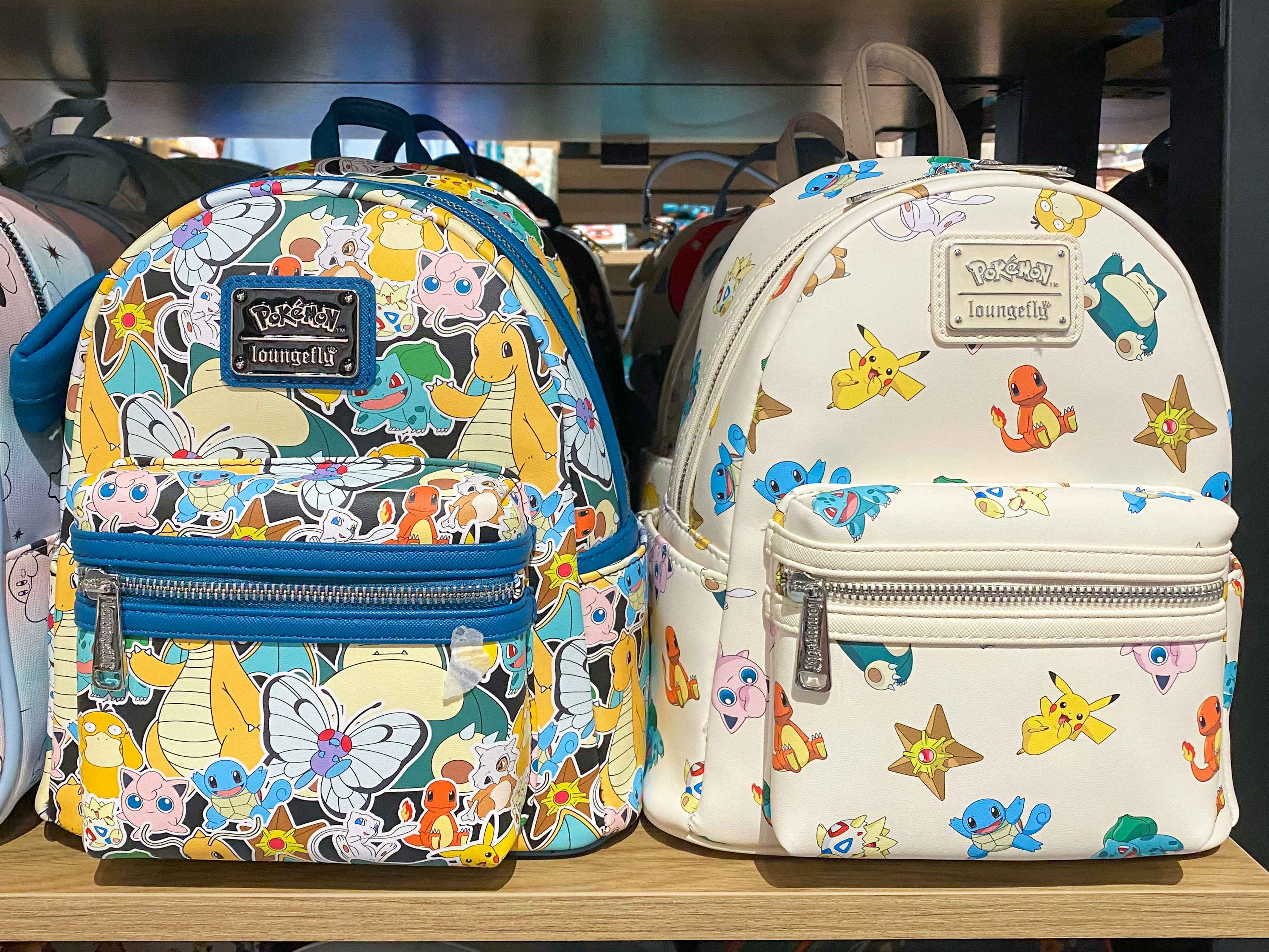 Pokemon Loungefly backpack purses on a shelf at BoxLunch
