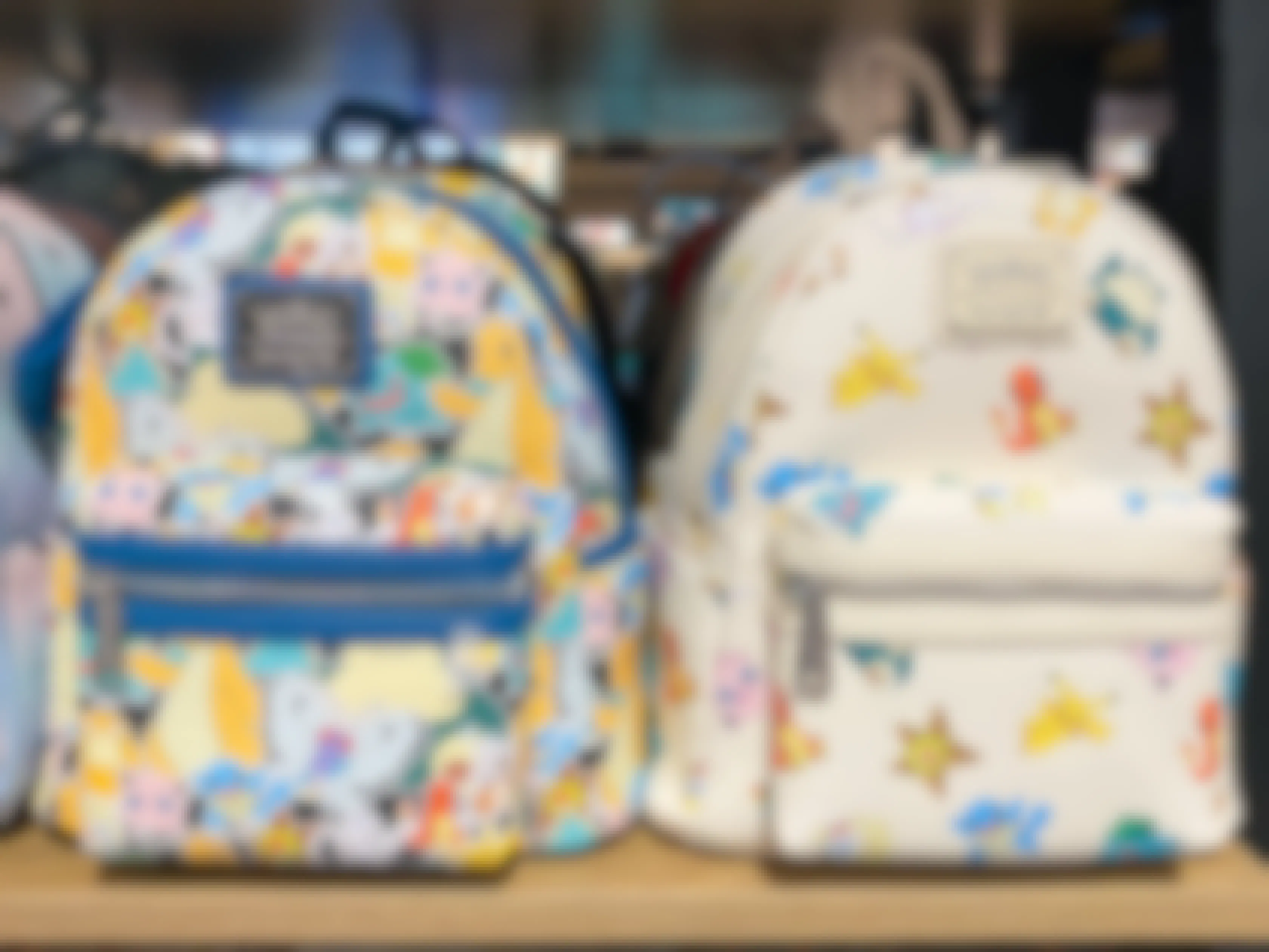 Pokemon Loungefly backpack purses on a shelf at BoxLunch