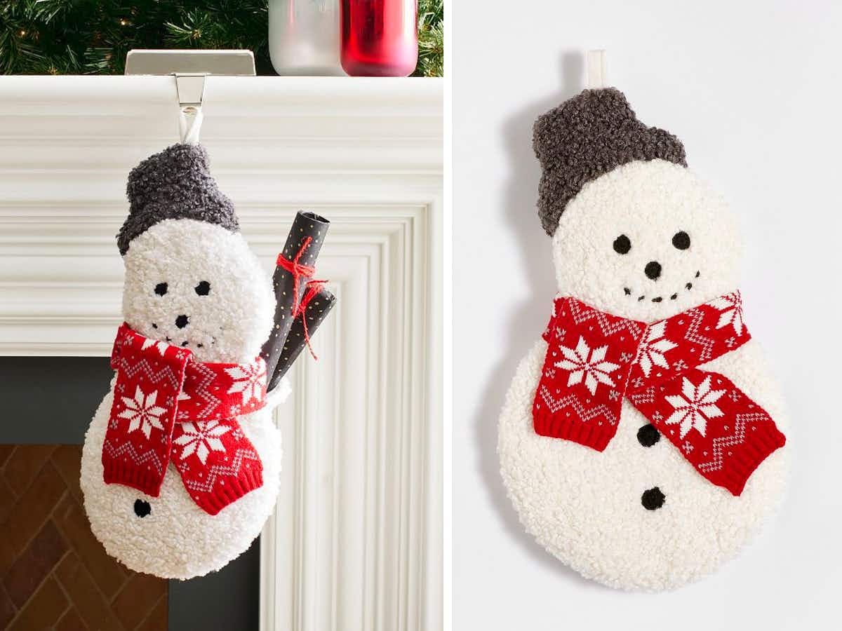 An Archie the Snowman Cozy Teddy Stocking hanging from a mantel and on a grey background