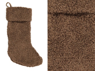 A Cupcakes & Cashmere Cuffed Teddy Stocking hanging from a mantel, and a close up on the fuzzy detail.