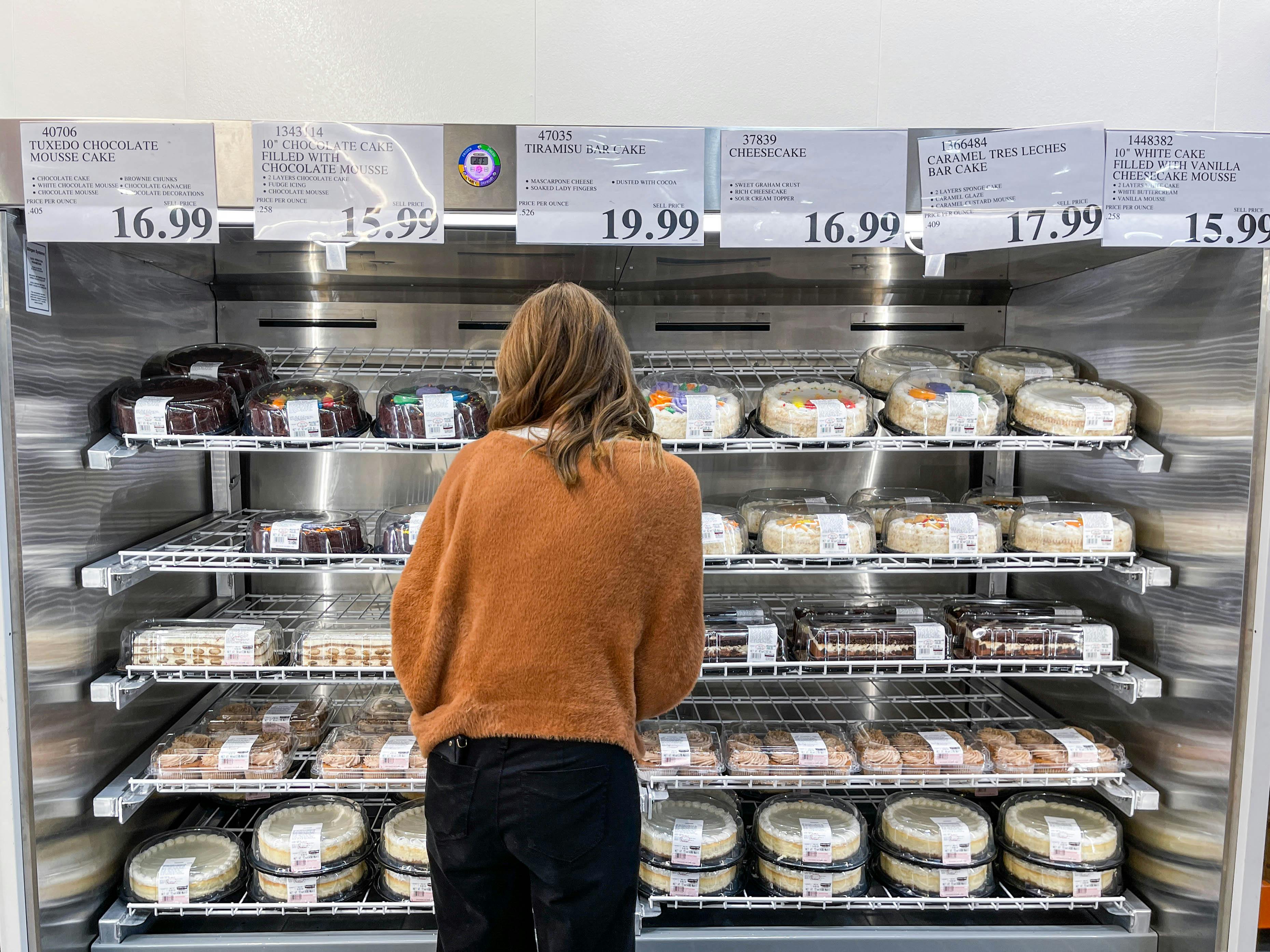 person looking at the costco bakery section