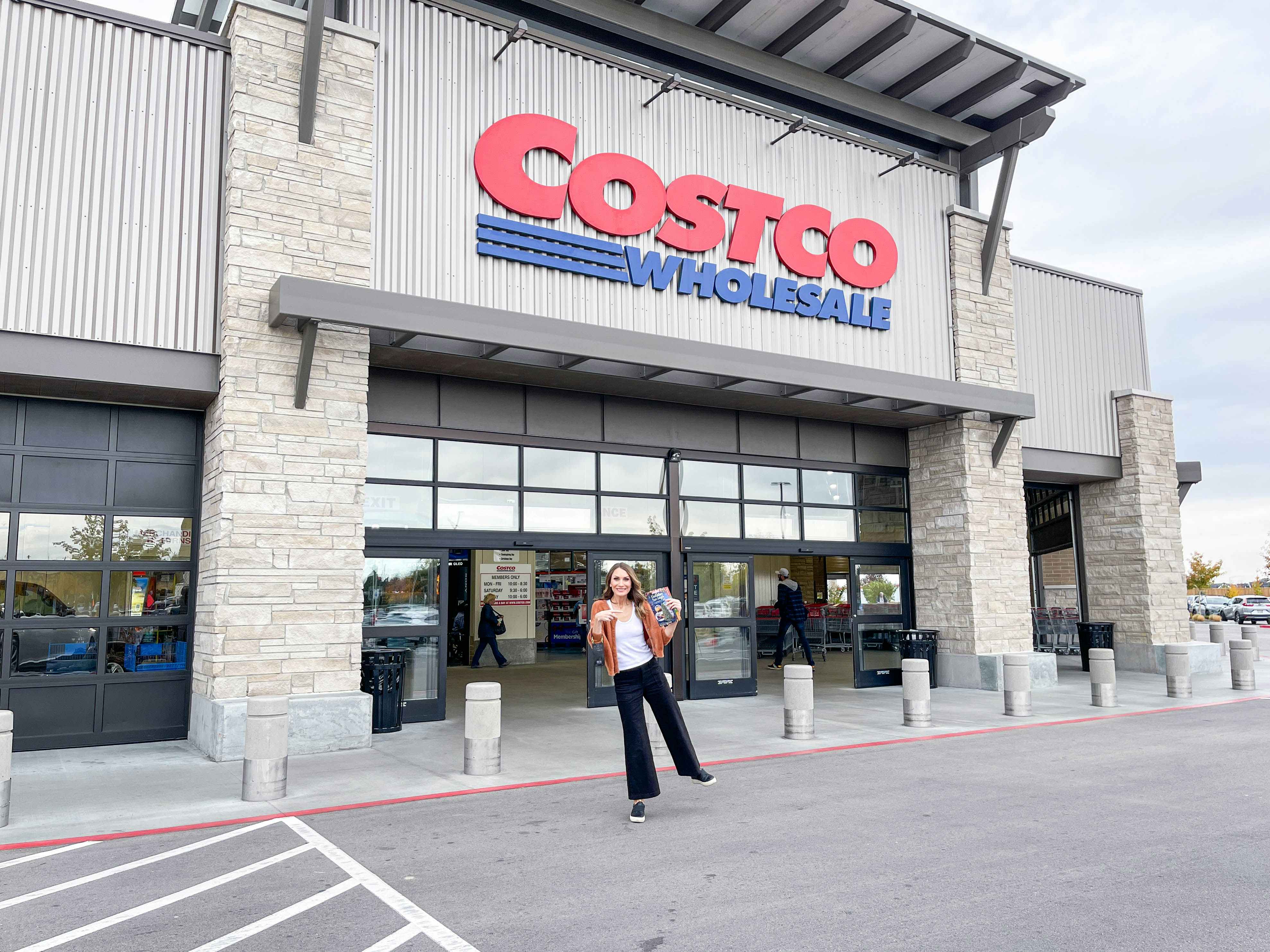 costco storefront with heather standing in front