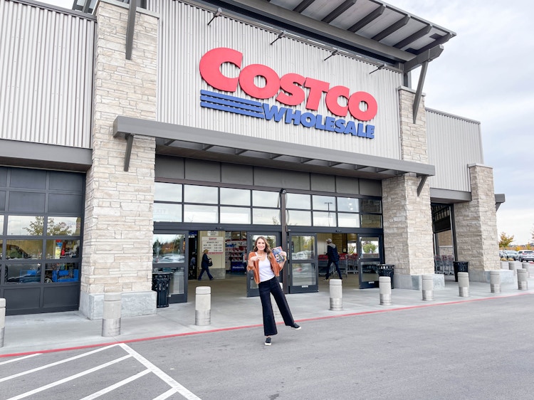 costco storefront with heather standing in front