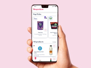 hand holding phone with screen showing shopmium rebate app