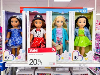 Disney i love you 4 ever dolls on the shelf at Target with a 20% off sale sign