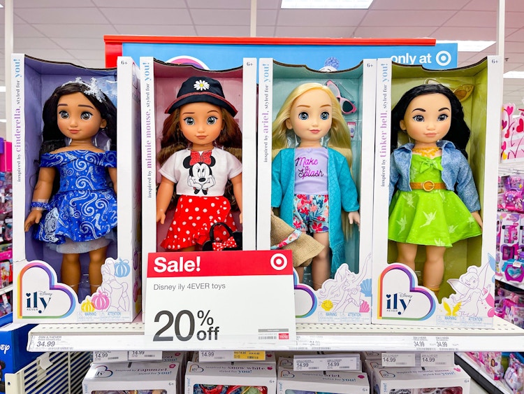 Disney i love you 4 ever dolls on the shelf at Target with a 20% off sale sign
